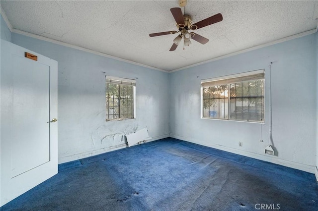 empty room with radiator heating unit, a textured ceiling, and dark colored carpet