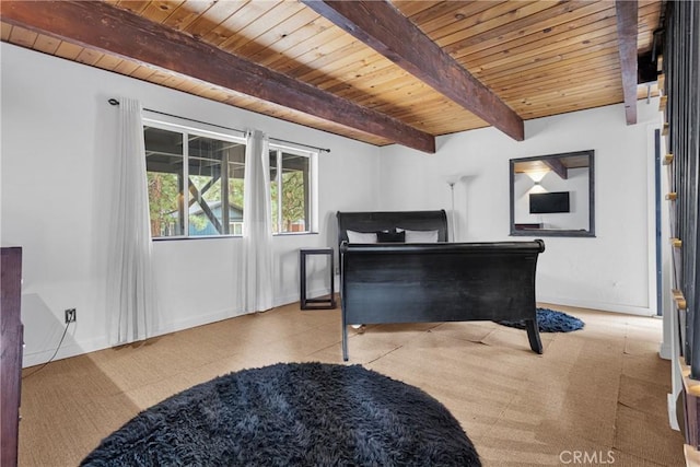 bedroom featuring beamed ceiling and wood ceiling