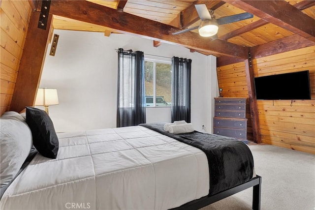 bedroom with carpet flooring, ceiling fan, beamed ceiling, wood walls, and wood ceiling