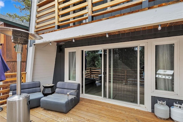 deck featuring a grill