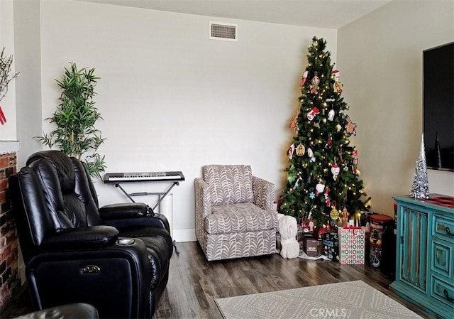 living area featuring dark wood-type flooring