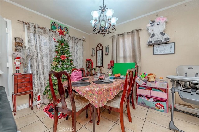 tiled dining area with an inviting chandelier and ornamental molding