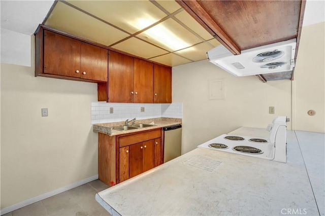 kitchen featuring tasteful backsplash, sink, stainless steel dishwasher, and ventilation hood