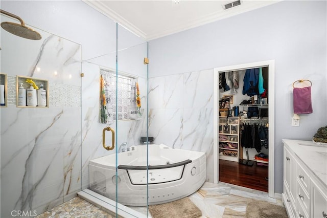 bathroom with vanity, separate shower and tub, and ornamental molding