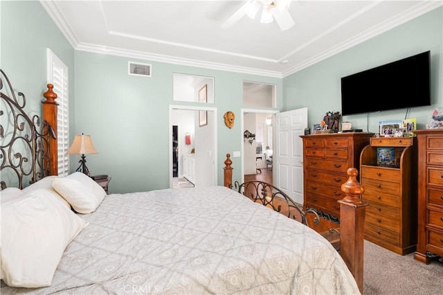 bedroom with carpet flooring, ceiling fan, and ornamental molding