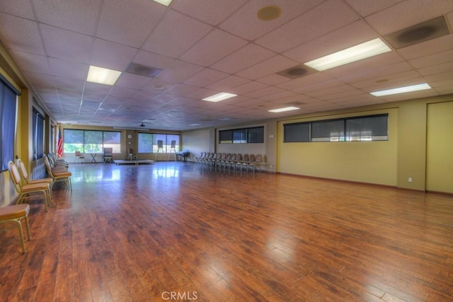 interior space featuring hardwood / wood-style floors and a paneled ceiling