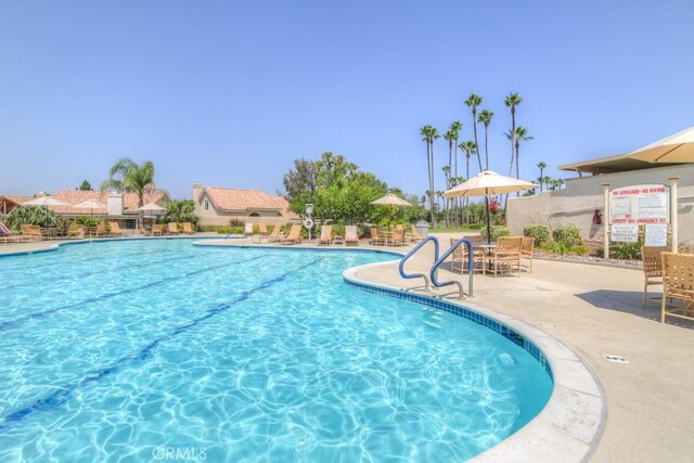2028 Melbourne Cir, Banning, CA 92220 - community pool featuring a patio