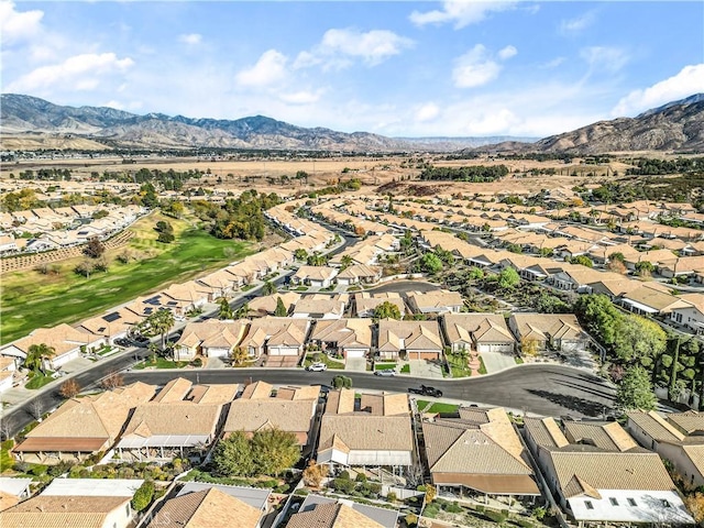 drone / aerial view featuring a mountain view