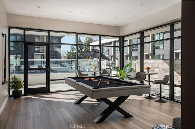 rec room with wood-type flooring and billiards