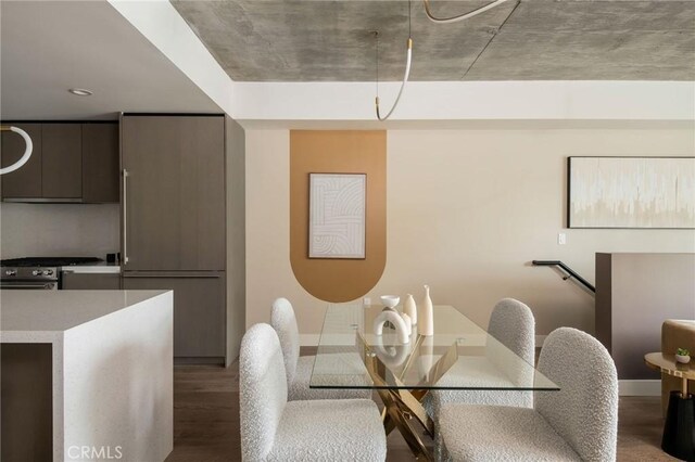 dining area with wood-type flooring