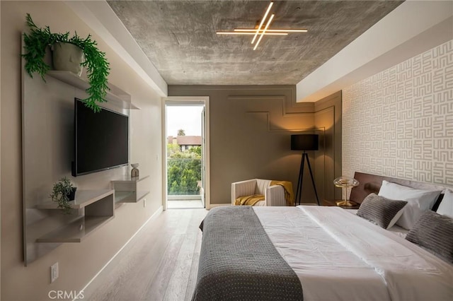 bedroom with wood-type flooring