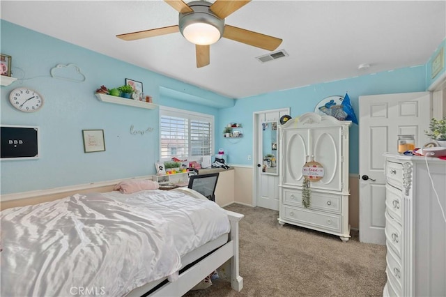 bedroom featuring light colored carpet and ceiling fan