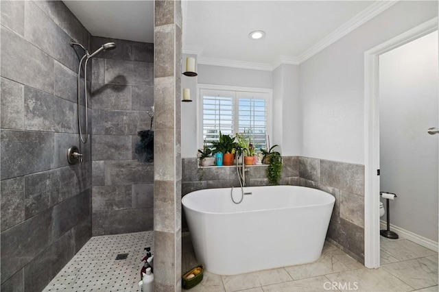 bathroom with plus walk in shower, toilet, tile walls, and crown molding