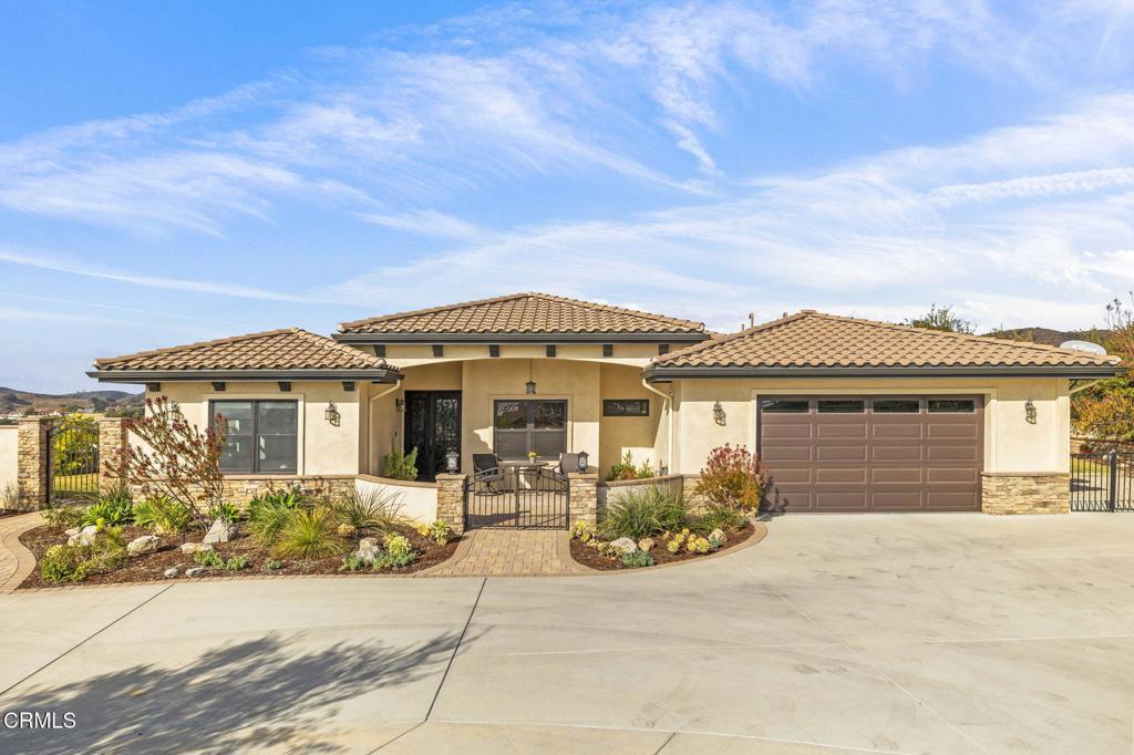 mediterranean / spanish house featuring a garage