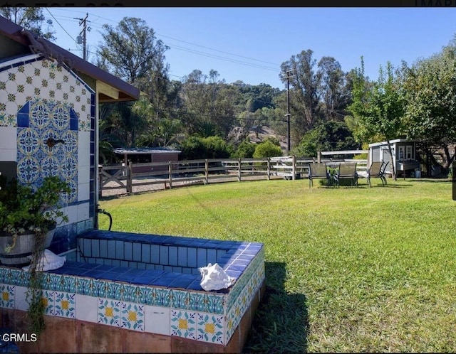 view of yard with a shed