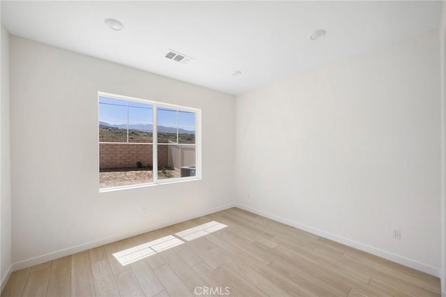 23724 Wilcox Dr, Newhall, CA 91321 - spare room with light wood-type flooring and baseboards