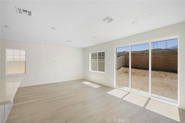 23724 Wilcox Dr, Newhall, CA 91321 - spare room featuring light wood finished floors