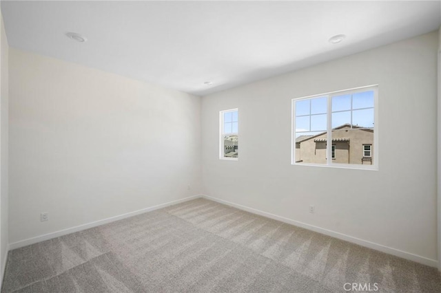 view of carpeted spare room