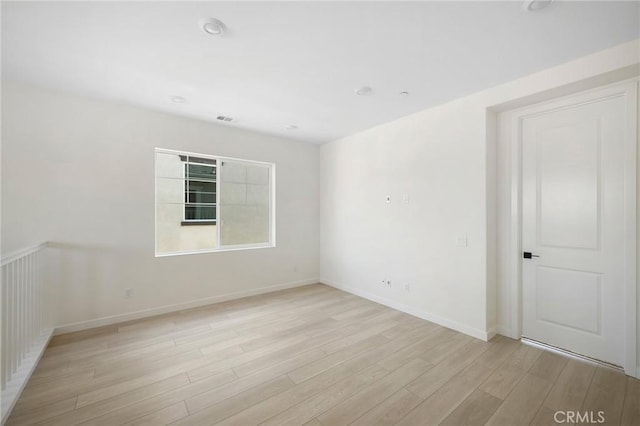 empty room featuring light wood-type flooring