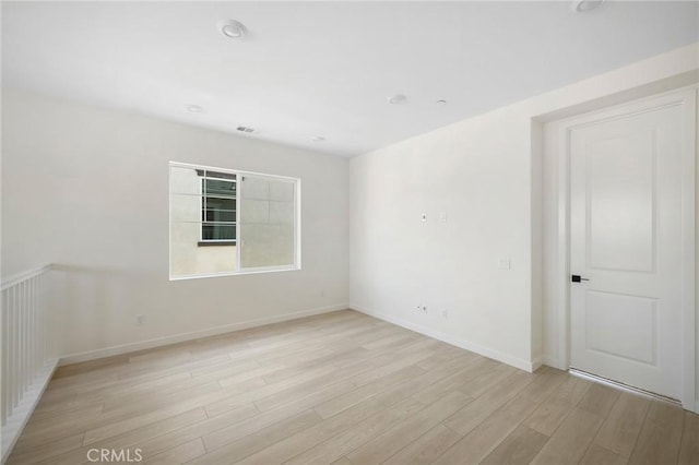 23724 Wilcox Dr, Newhall, CA 91321 - unfurnished room with light wood-style flooring and baseboards