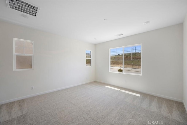 view of carpeted spare room