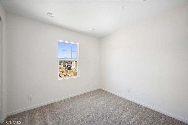 empty room featuring carpet flooring