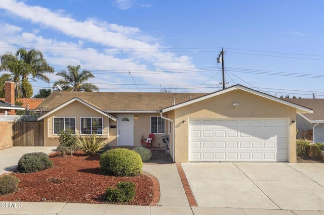 ranch-style home with a garage