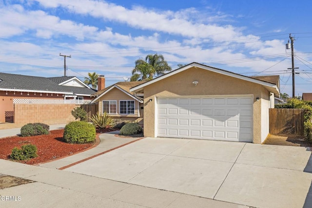 ranch-style home with a garage