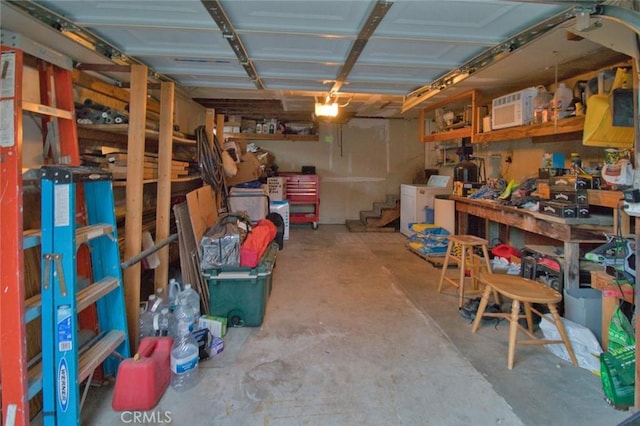 storage area featuring washer and clothes dryer