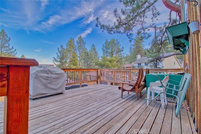 wooden terrace with grilling area