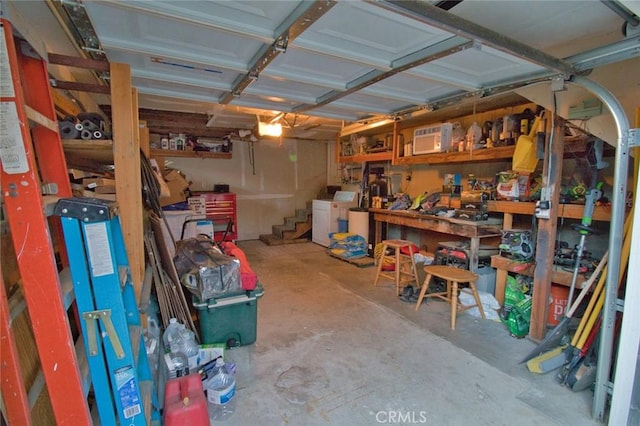 storage area with separate washer and dryer