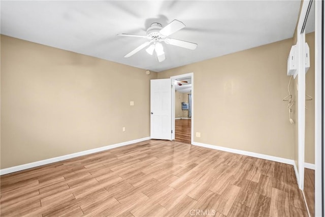 unfurnished bedroom with light wood-type flooring and ceiling fan