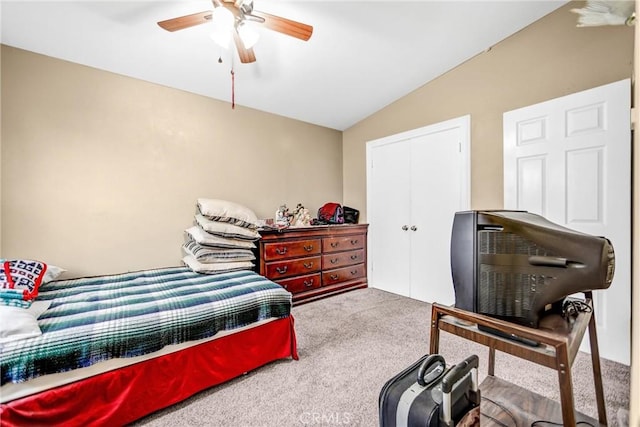 carpeted bedroom featuring ceiling fan and lofted ceiling