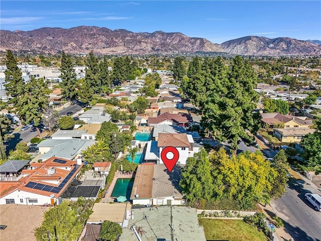 drone / aerial view featuring a mountain view