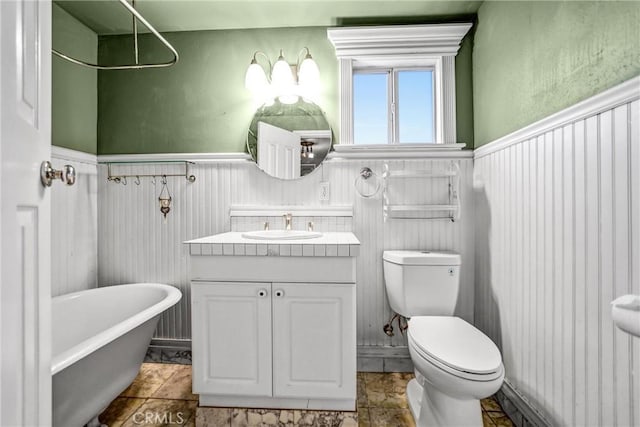 full bathroom with vanity, toilet, and shower with separate bathtub