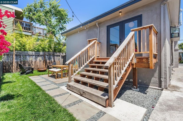 entrance to property featuring a patio