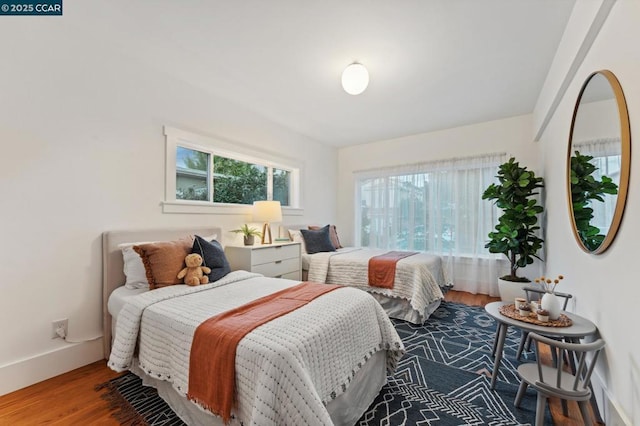 bedroom featuring hardwood / wood-style flooring