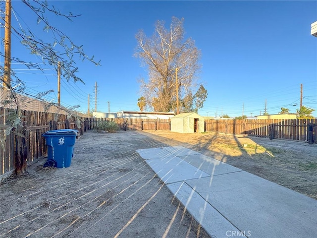 exterior space with a storage shed