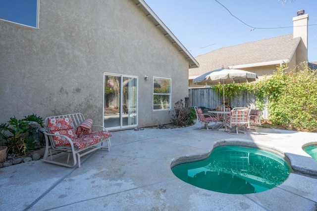 view of pool with a patio area