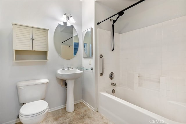 full bathroom featuring sink, toilet, and bathing tub / shower combination