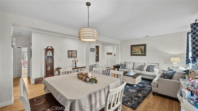 dining room featuring light hardwood / wood-style floors