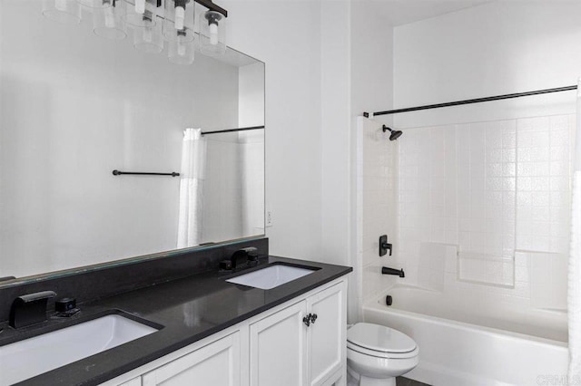 full bathroom with vanity, toilet, and shower / bath combination