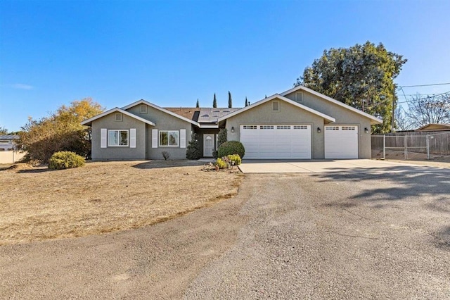 single story home with a garage