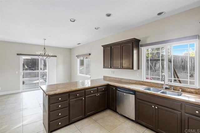 kitchen with dishwasher, a healthy amount of sunlight, kitchen peninsula, and sink