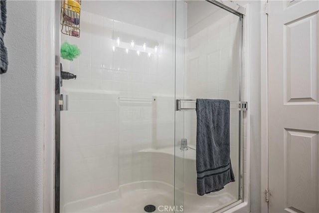 bathroom featuring walk in shower