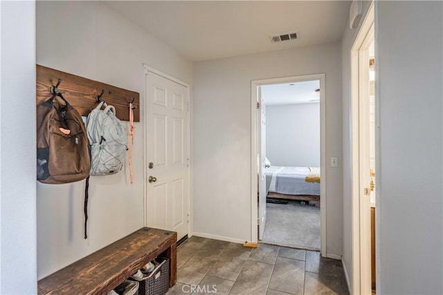 mudroom with tile patterned flooring