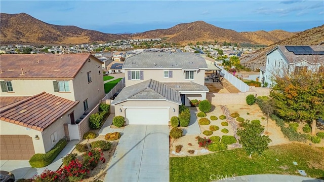 drone / aerial view featuring a mountain view