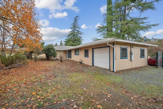 exterior space with a garage