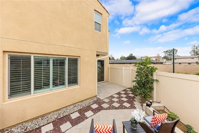 view of home's exterior featuring a patio area