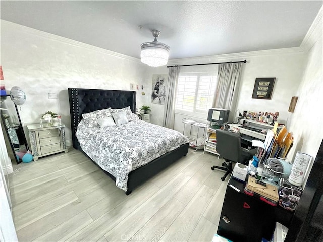 bedroom with wood-type flooring and crown molding